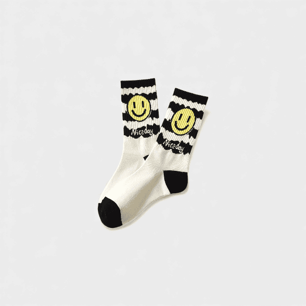 2023 new black and white smiley face men's socks mid-calf length socks autumn and winter high waist women's socks couple sports stockings cross-border